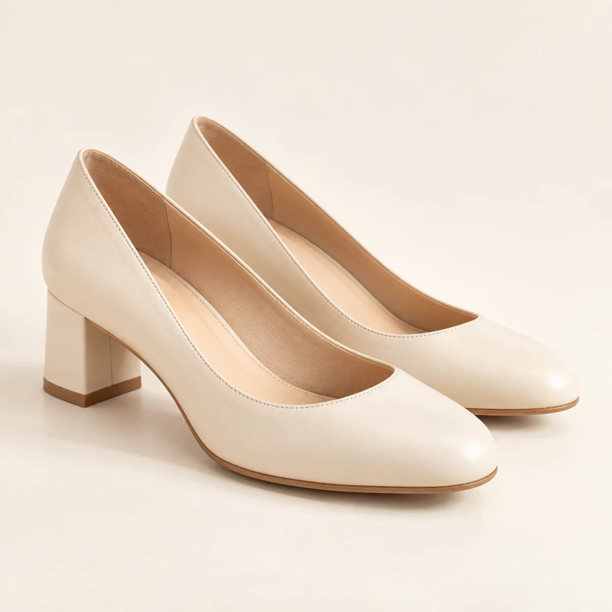 Adèle Block-Heel Pumps in Cream